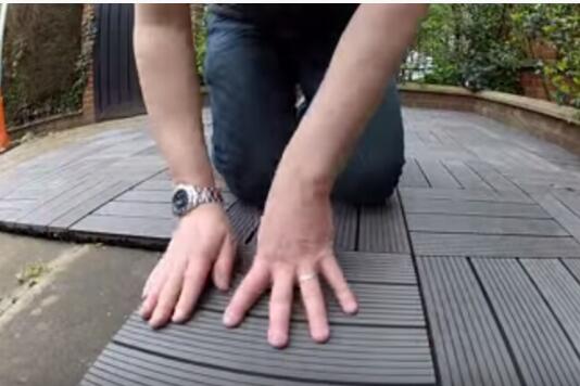 install DIY interlocking deck tiles